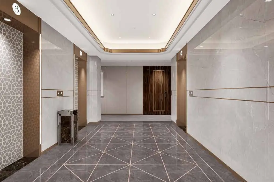 A marble lift lobby with patterned screens and a timber door at the end