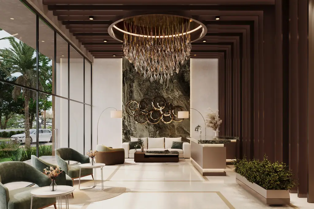 A double-height reception with a ring chandelier, timber walls and a stone feature wall