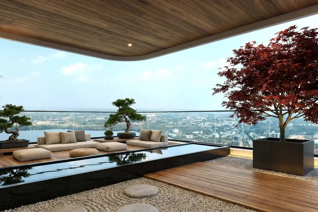 A covered terrace with low sofas, bonsai and a reflecting pool, the lake and city far below